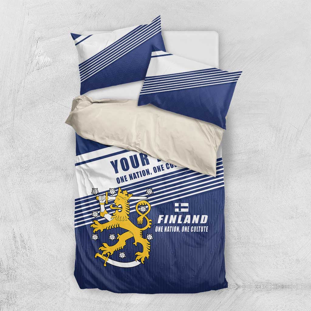 Blue and white bedding set with lion crest and striped bands, two pillowcases