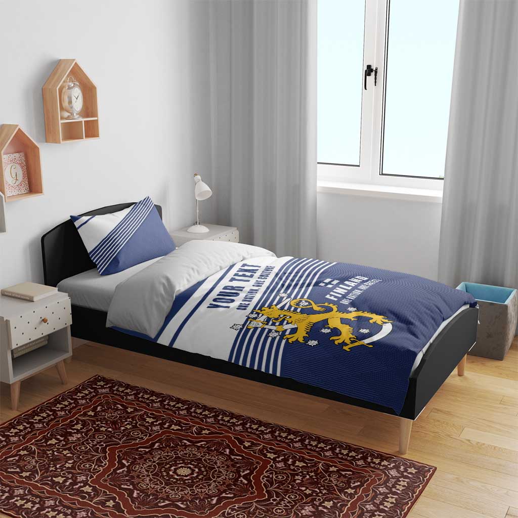 Blue and white duvet cover with Finland lion crest and striped bands, two pillowcases