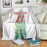 Custom football blanket, white with green/blue number 17 and red “YOUR TEXT” print
