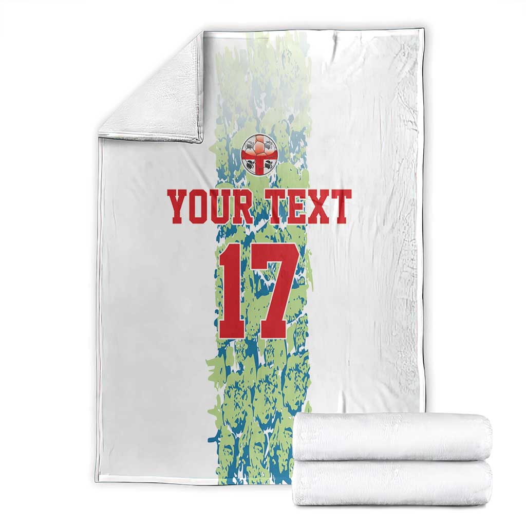 Custom football blanket set, folded white blanket with number 17 graphic and red “YOUR TEXT”