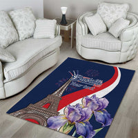 Blue area rug with Eiffel Tower, Bastille Day graphic, and purple flower bouquet
