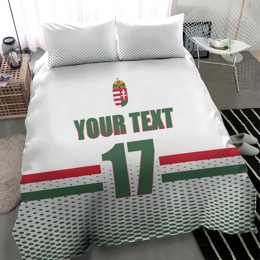 White bedding set with two pillows featuring “YOUR TEXT” and Hungarian crest with “17”