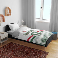 White ice hockey duvet on bed with two pillows; Hungarian “17” and crest graphic