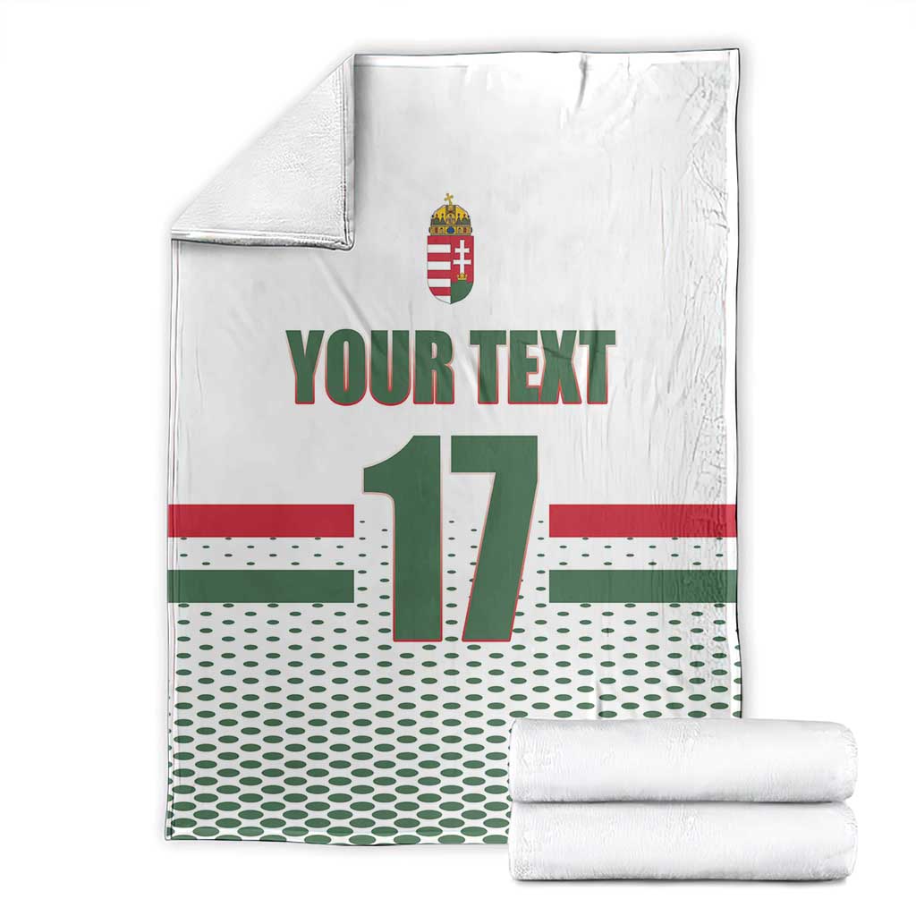 White custom ice hockey blanket with folded stack; Hungary crest, 'YOUR TEXT', number 17