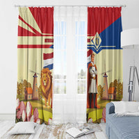 Window curtain panels with lion and knight motif, red blue yellow, visible top tabs