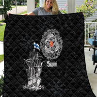 Black quilt with diamond stitching and white Viking ship graphic with crest and “Suomi” text