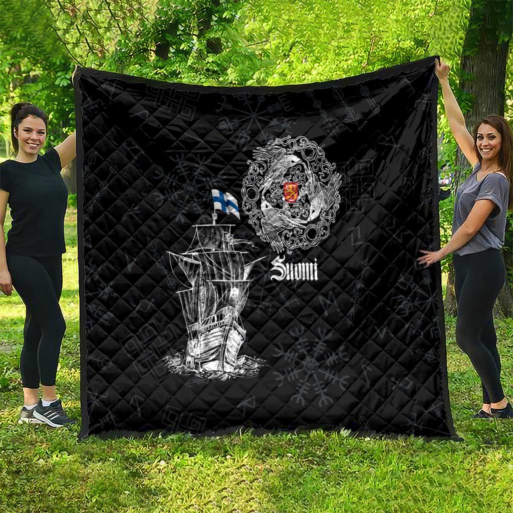Black quilt with diamond quilting and large white Viking ship design, crest, and “Suomi” text