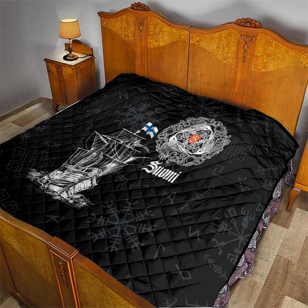 Black quilt with diamond quilting, white Viking ship illustration, crest emblem, and “Suomi” text