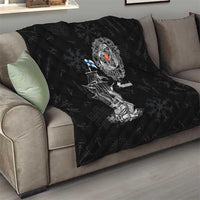 Black quilt with diamond quilting and white Viking ship graphic, crest emblem, and “Suomi” text