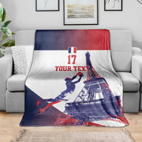 France-themed basketball blanket with Eiffel Tower print and number 17 on a sofa
