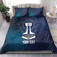 Navy galaxy bedding set with rune sword emblem on duvet and two matching pillows