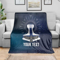 Navy Viking blanket draped on gray sofa with white Thor emblem and 'YOUR TEXT'