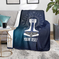 Navy Viking blanket spread on carpet with white Thor emblem and 'YOUR TEXT'