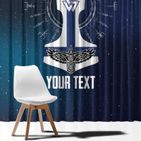 Close view of navy curtain showing white Viking cross, winged star, and custom text.