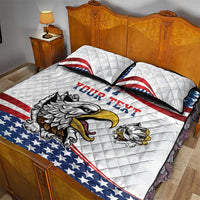 White quilt and two pillows with eagle mascot, flag stripes, and custom text