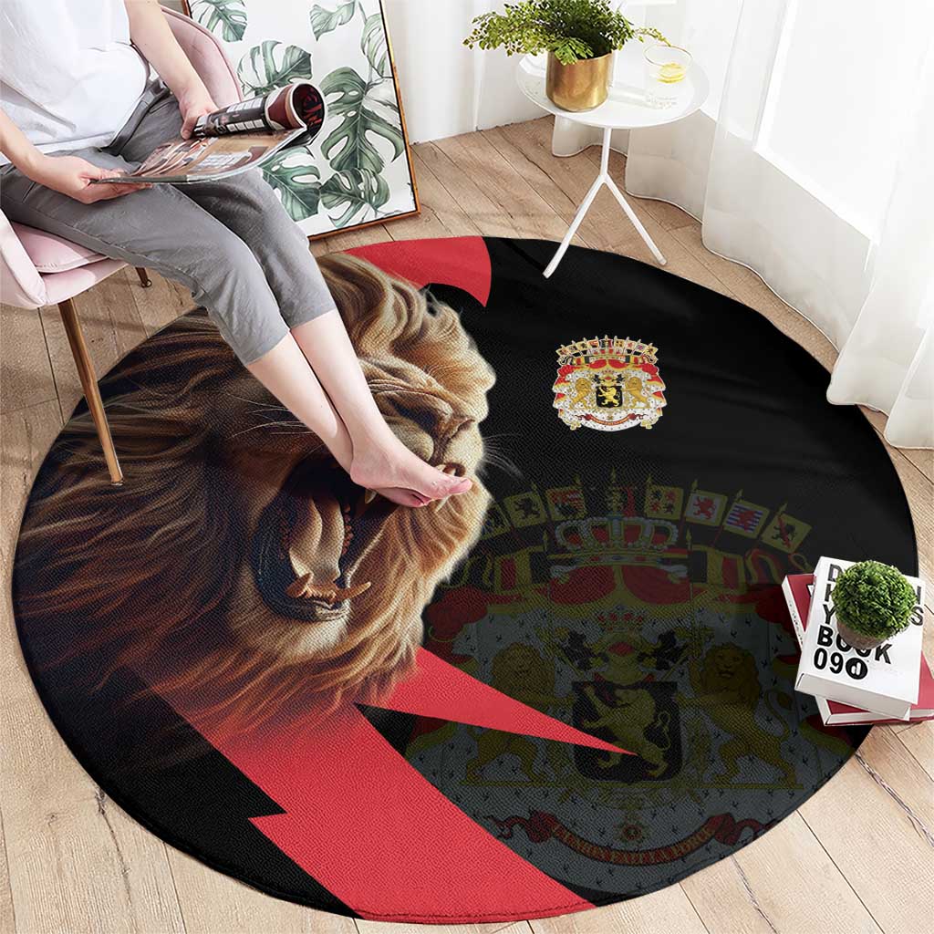 Round black rug with large lion face, crown crest, and red diagonal graphic