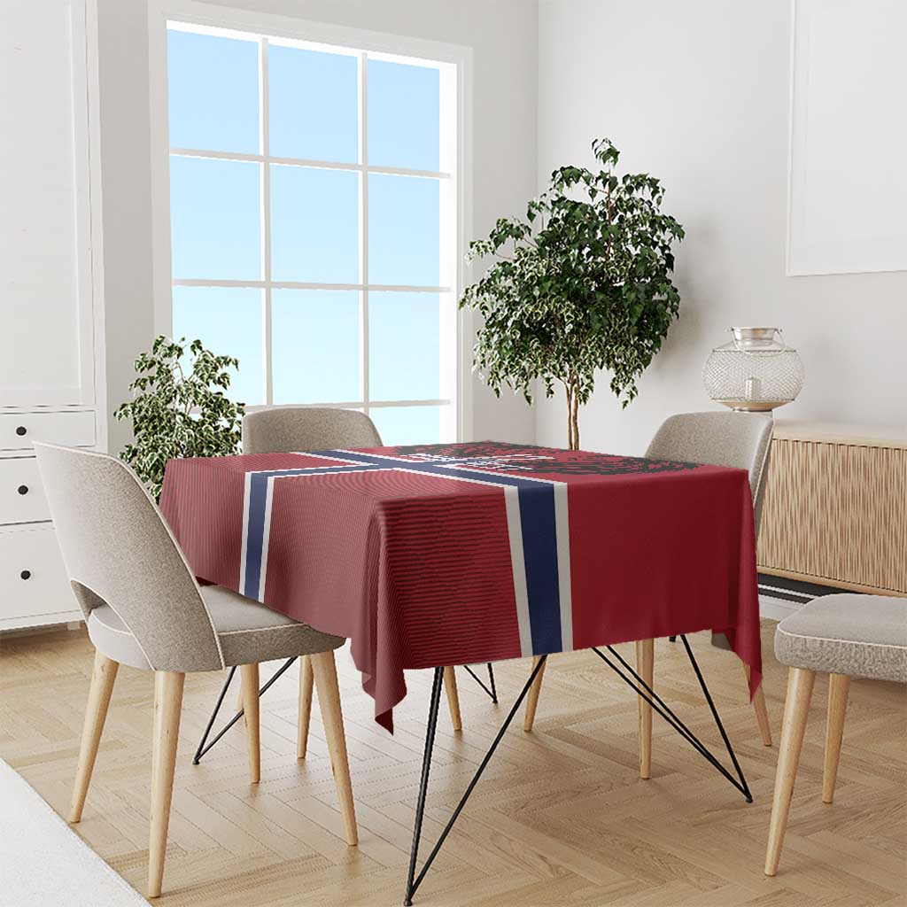 Red football tablecloth with Norway flag cross on dining table with chairs