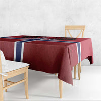 Red tablecloth with Norway flag cross and lion motif, hanging over bench seating