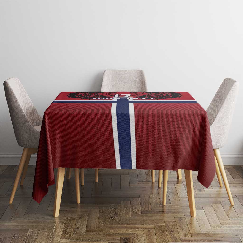 Red Norway-themed football tablecloth with flag cross centered on table, ready for dining