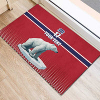 Red hockey rubber doormat showing 'YOUR-TEXT' across navy stripes with polar bear graphic