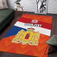 Flag-themed personalized area rug, orange/red/blue/white crest with 'YOUR TEXT'