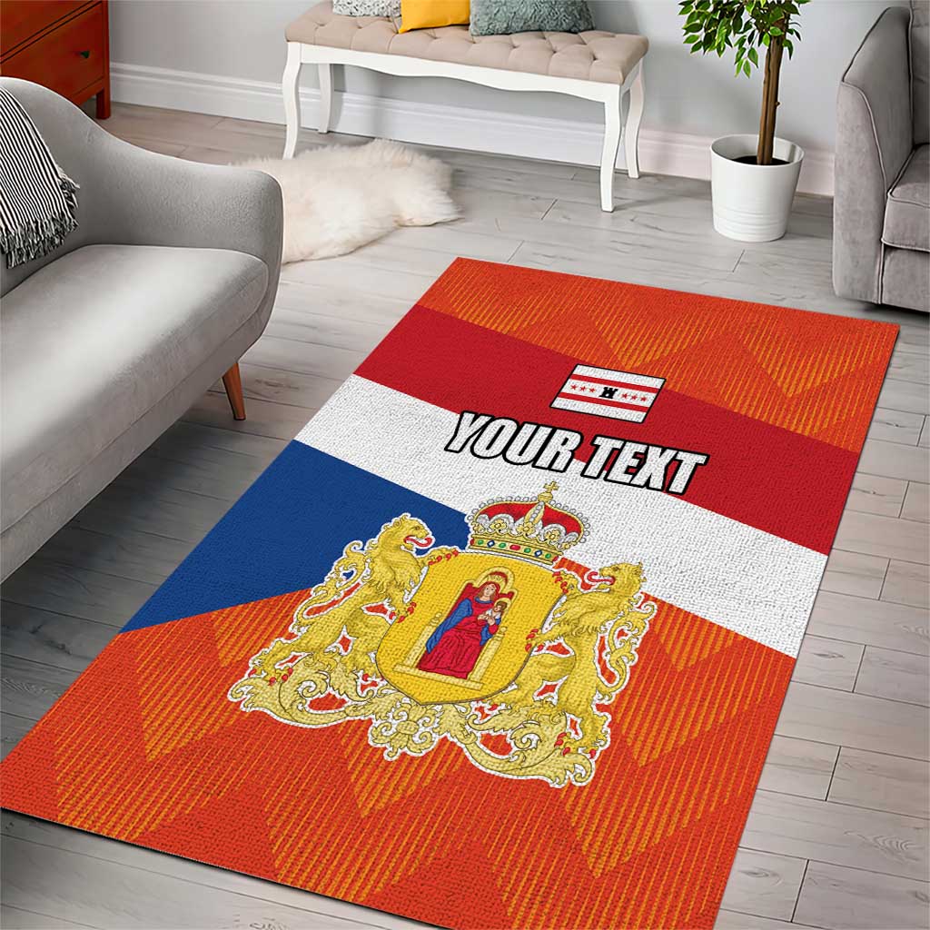 Flag-style personalized area rug featuring a large crest and 'YOUR TEXT' on orange