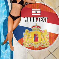 Round beach blanket with fringed edge, Drenthe flag print and 'YOUR TEXT' on pool tiles.