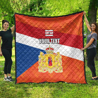 Orange quilt flag with white and blue diagonal stripes, crest emblem, and “YOUR TEXT”