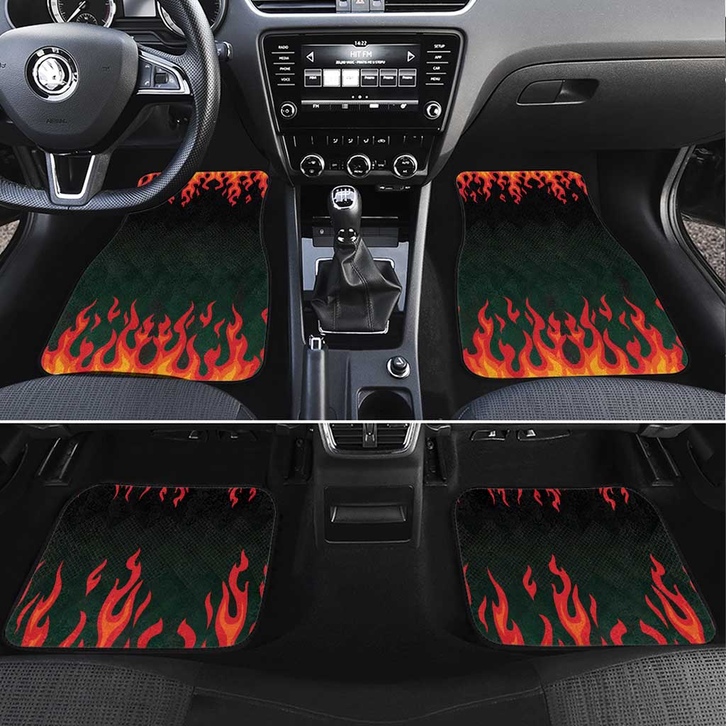 Black car mats with red and orange flame pattern, placed in front footwells