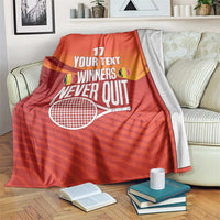 Red tennis blanket with 'WINNERS NEVER QUIT', number 17, and racket graphic