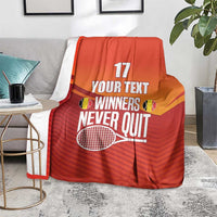 Red tennis blanket with 'WINNERS NEVER QUIT', number 17, and racket artwork