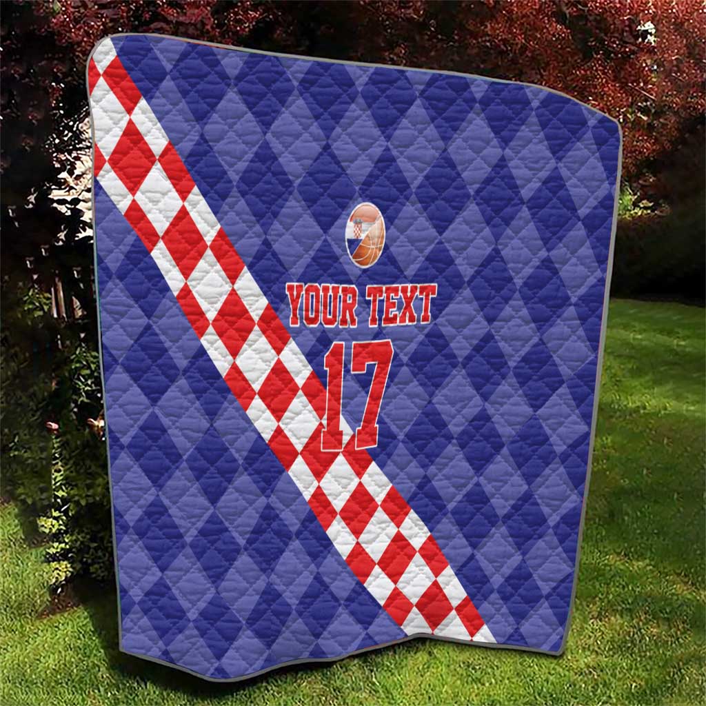Blue quilt with red-and-white check diagonal stripe, basketball emblem, and “YOUR TEXT 17”