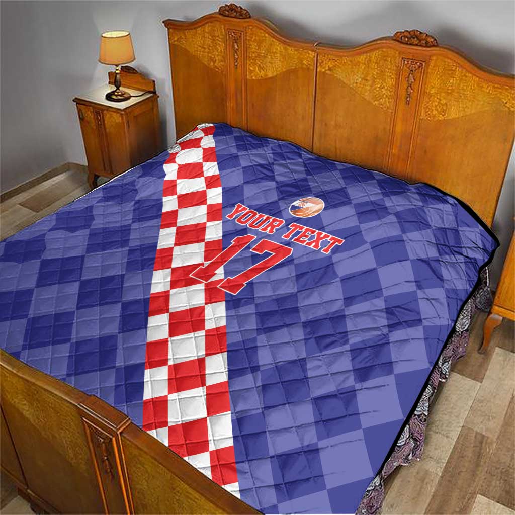 Blue quilt on bed with red-and-white check diagonal stripe, basketball icon, and “YOUR TEXT 17”