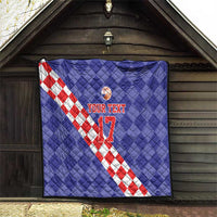 Blue quilt hanging with red-and-white check diagonal stripe, basketball emblem, and “YOUR TEXT 17”