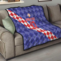 Blue quilt on sofa with red-and-white check diagonal stripe, basketball icon, and “YOUR TEXT 17”