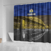 Blue-and-gray shower curtain with GELDERLAND crest and bridge reflection print