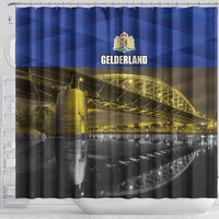 Blue shower curtain with GELDERLAND crest, golden bridge skyline and river print