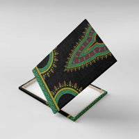 Black dashiki-style canvas wall art with teal and gold V pattern, angled view (unframed)