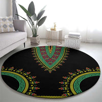 Black round carpet with green center V motif and yellow floral dashiki border