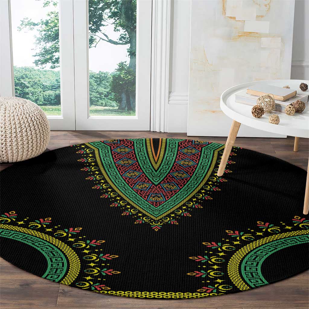 Black round carpet with green center medallion and yellow botanical dashiki border