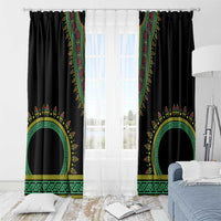 Black window curtains with ornate circular emblem motifs and geometric teal border trim