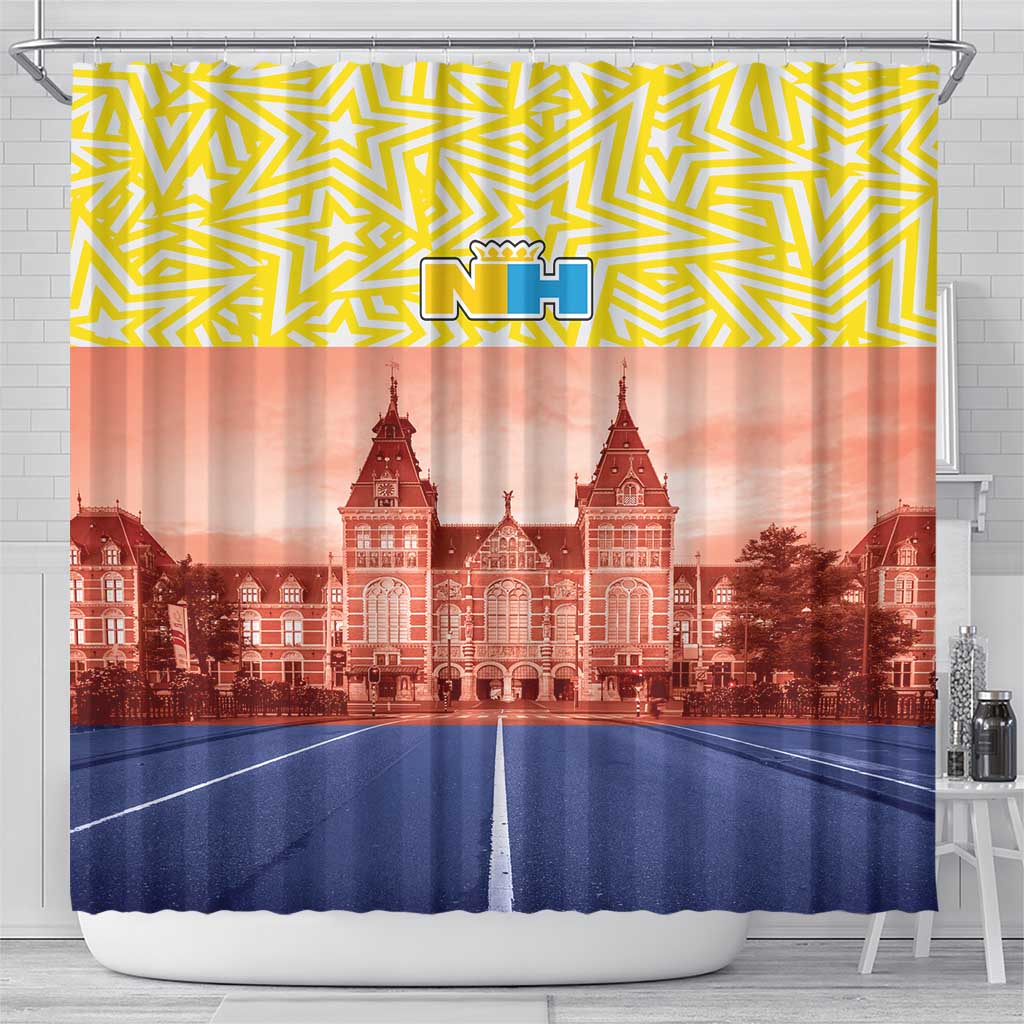Shower curtain with yellow zigzag pattern, NH logo, red landmark skyline, blue base
