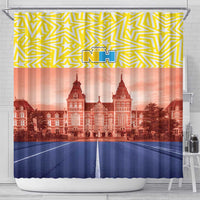 Shower curtain with yellow zigzag pattern, NH logo, red landmark skyline, blue base