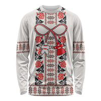 Traditional long sleeve shirt on white with red/black folk embroidery and ribbon print