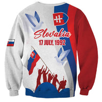 Unisex graphic sweatshirt in light gray with red/blue print and 17 JULY, 1992 text