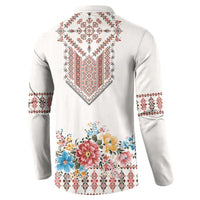 Light gray button sweatshirt back with geometric red motif and floral panel