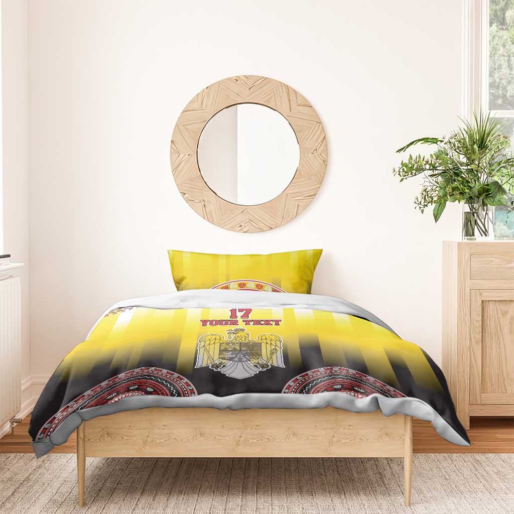 Yellow and black bedding set with eagle crest duvet, matching pillowcases, and round border