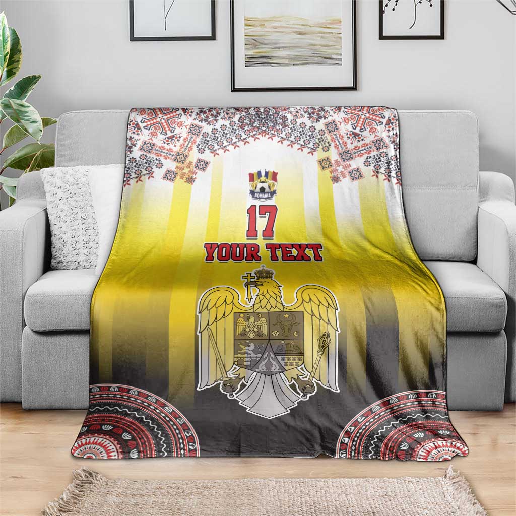 Custom Romania football blanket draped on sofa, yellow gradient with crest and red rim