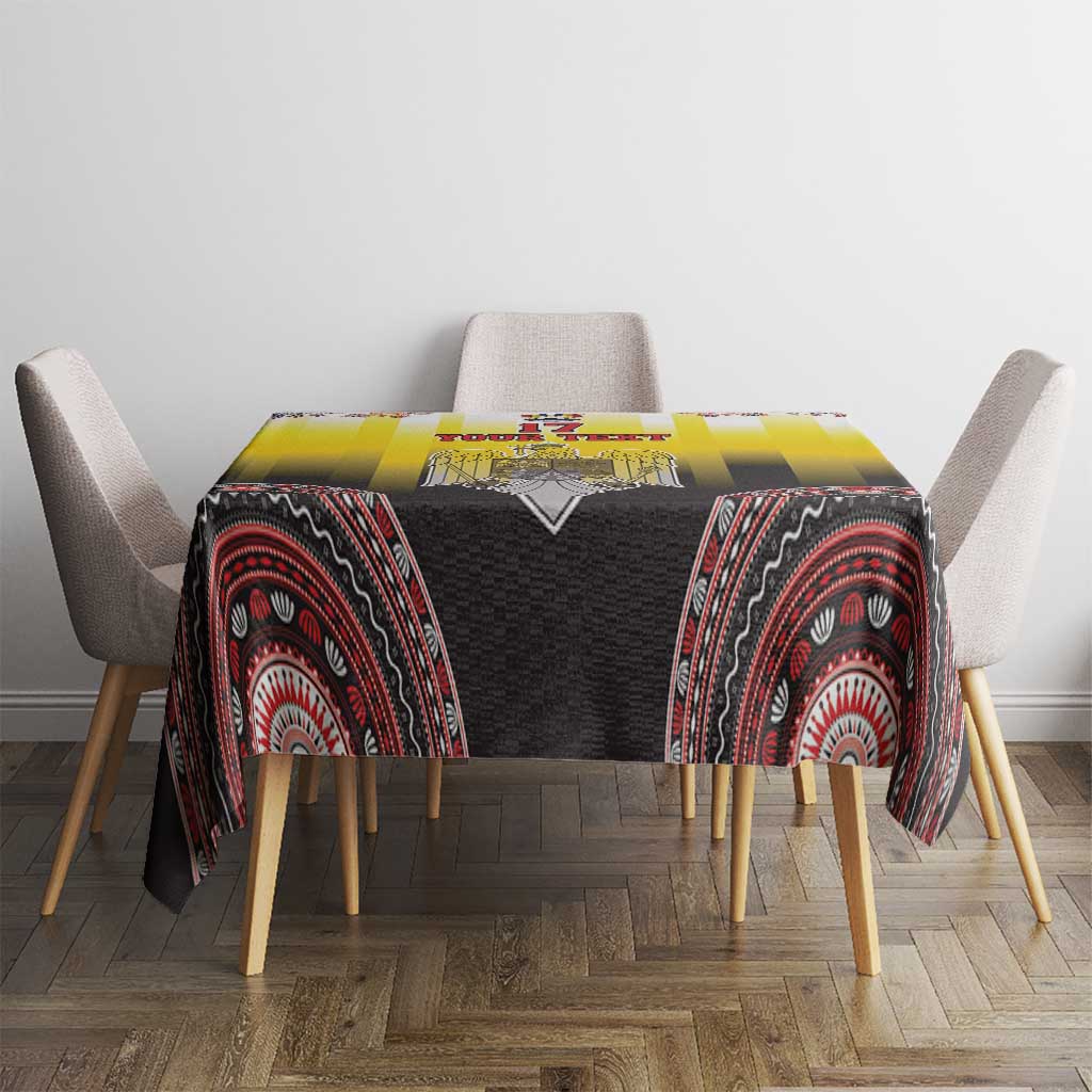 Yellow tablecloth on dining table with red and black circular patterns