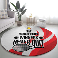 Round tennis carpet, grey with red swirl, “Winners Never Quit” and racket graphic
